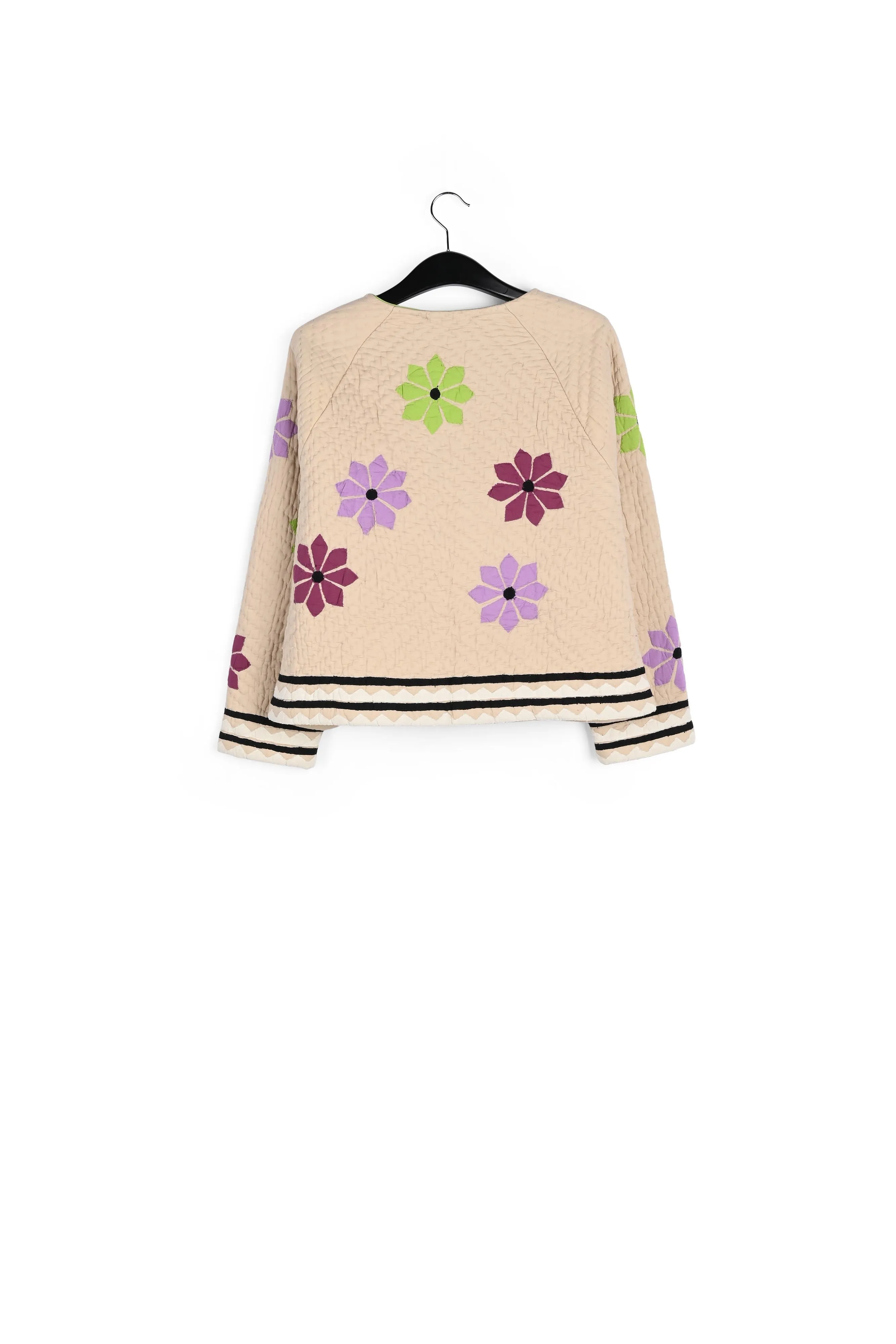 Off-white quilted jacket with flower patches