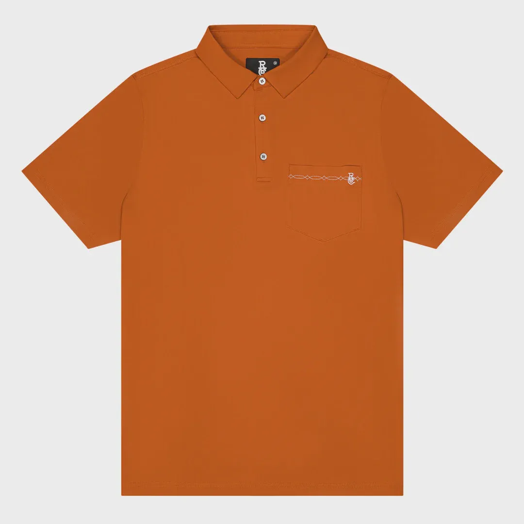Raised by Coyotes Texas Orange Bootstitch Pocket Polo